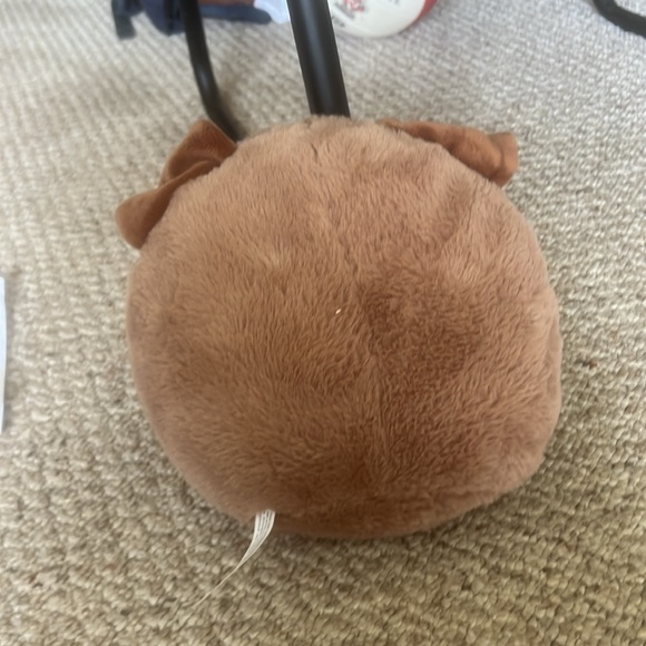 circular brown dog with heart shaped eyes and holding pizza plush - Picture 2 of 2